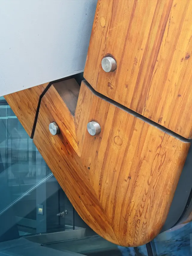 Laminated wooden beam fixed with bolts