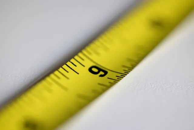 Close-up of a yellow measuring tape